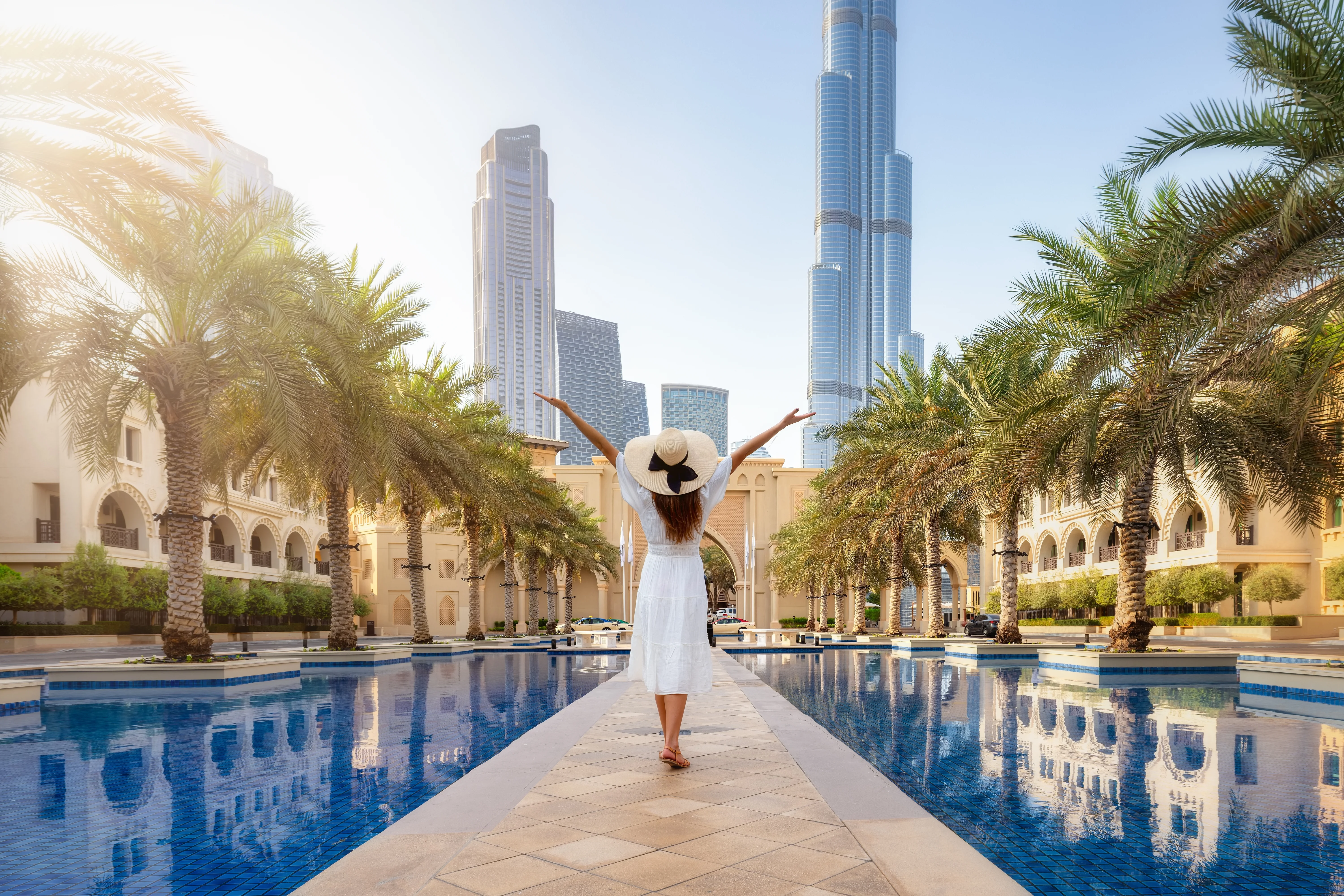 Dubai luxury lifestyle Burj Khalifa skyline artificial urban development vs natural Oman real estate investment